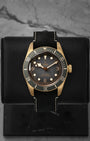 Front watch portrait of a pre-owned 2024 Tudor Black Bay Bronze Ref 79250BA-0001 featuring a slate grey dial and matching slate grey bezel, available at Noahs Fine Watches and Jewelry Dallas