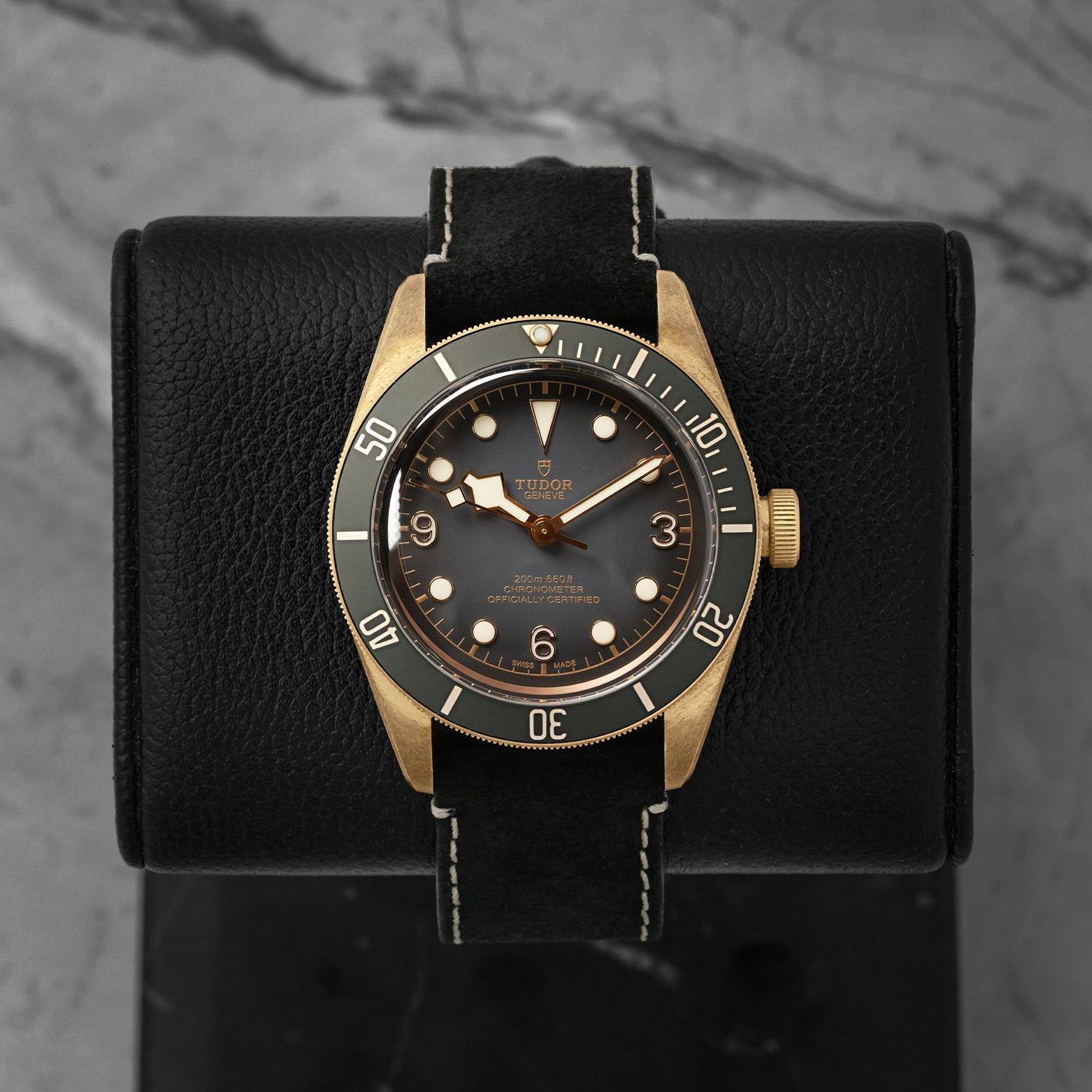 Front watch portrait of a pre-owned 2024 Tudor Black Bay Bronze Ref 79250BA-0001 featuring a slate grey dial and matching slate grey bezel, available at Noahs Fine Watches and Jewelry Dallas