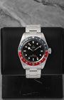 A 2021 Tudor Black Bay GMT reference 79830RB displaying its signature matte black dial, burgundy and blue Pepsi bezel, and iconic luminous snowflake hands at Noah's Fine Watches & Jewelry in Dallas