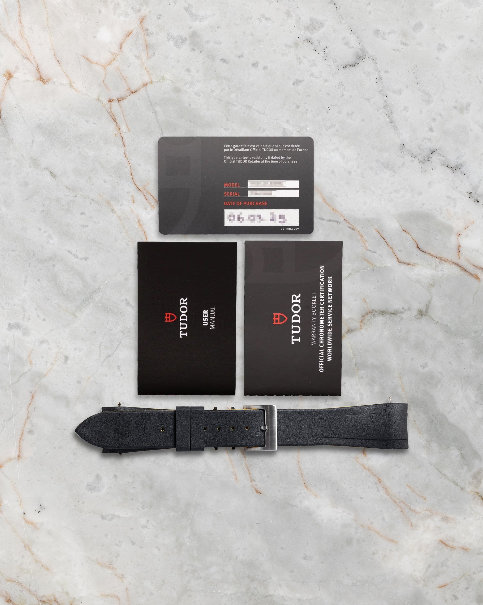 Official Tudor 2023 guarantee card, user manuals, and extra black fabric strap included with Black Bay Pro 79470