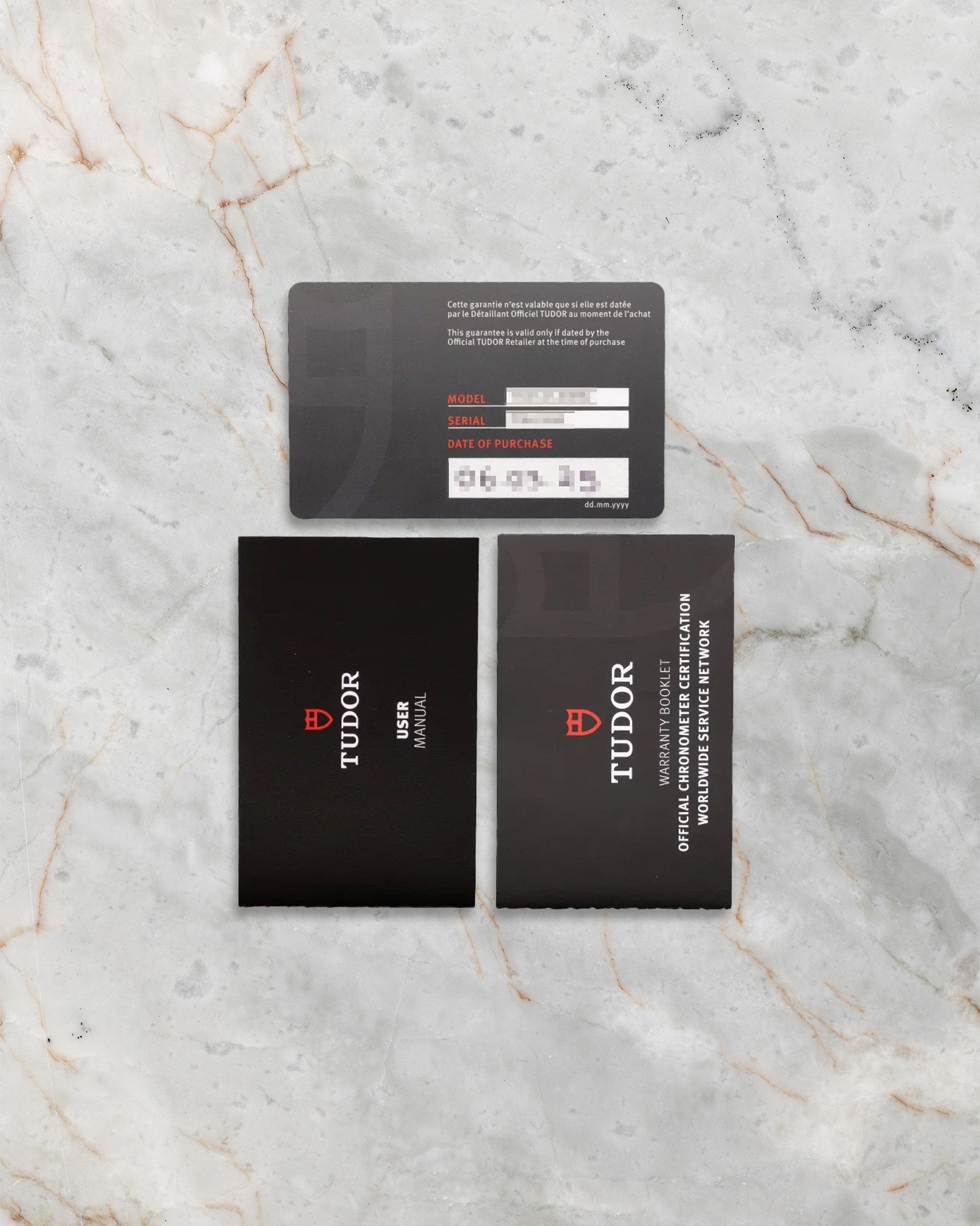 Original Tudor international guarantee card and official user manuals included with pre-owned Black Bay Pro 79470 set