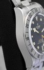 Satin-brushed stainless steel case profile and fixed 24-hour steel bezel view of pre-owned Tudor Black Bay Pro GMT