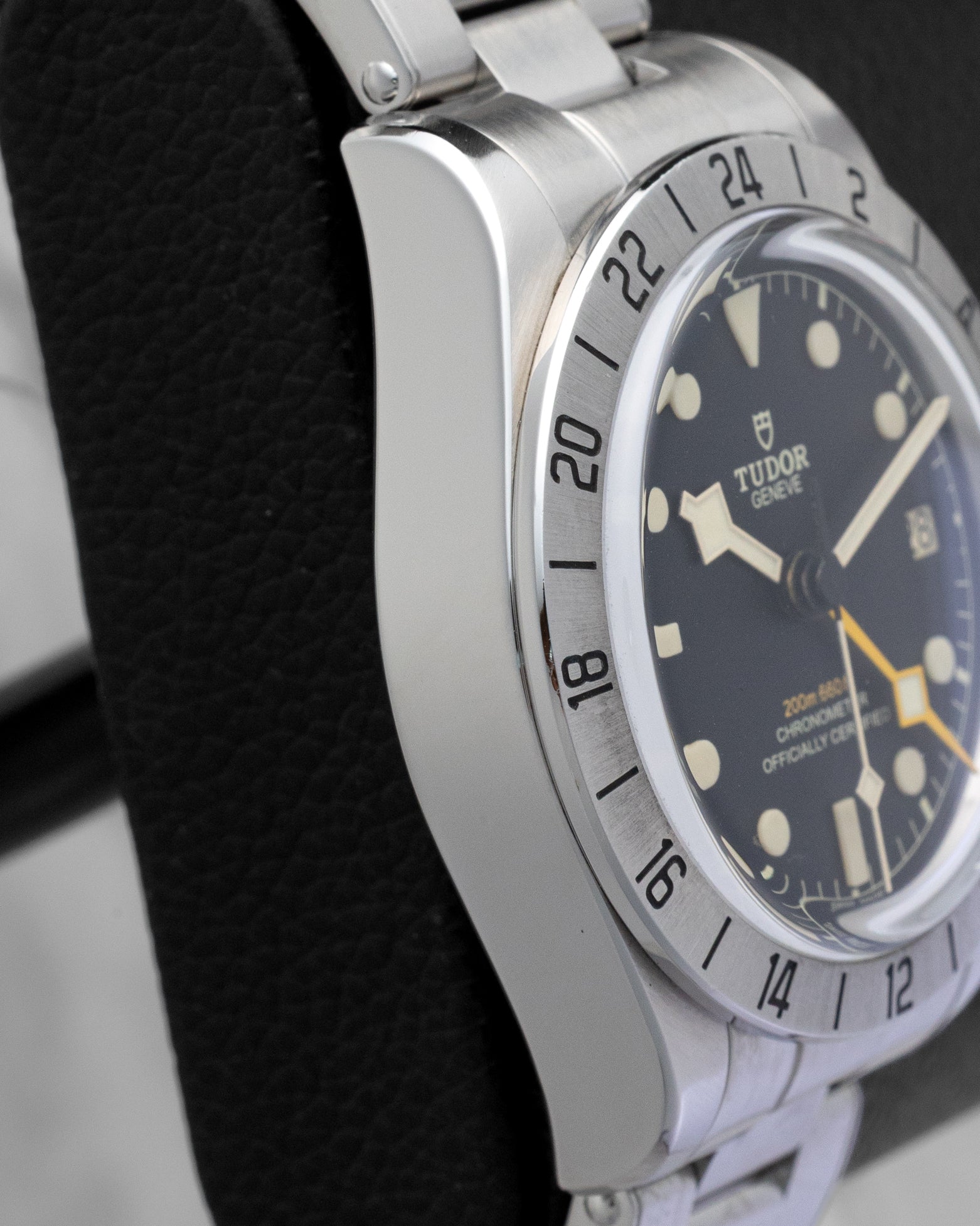 Satin-brushed stainless steel case profile and fixed 24-hour steel bezel view of pre-owned Tudor Black Bay Pro GMT