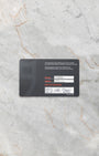 Tudor Pelagos Ultra reference 2543C1A7NU official warranty card displayed at Noah's Fine Watches & Jewelry