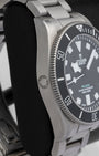Left side view highlighting the satin-finished titanium case and compact helium escape valve on the 43mm Tudor Pelagos Ultra
