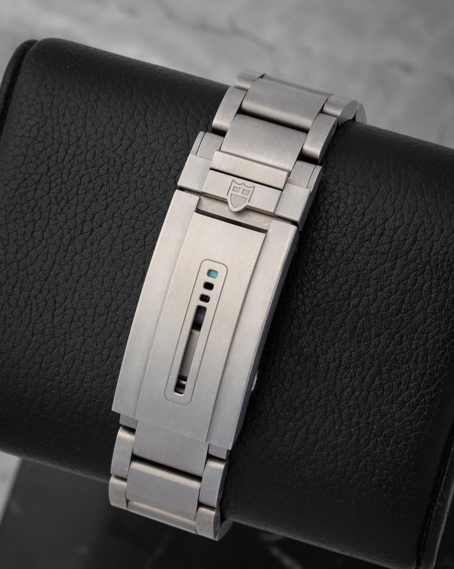 Close-up of the titanium three-link bracelet and Tudor T-fit folding clasp with safety catch and diver's extension