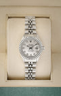 Vintage 1974 Rolex Lady-Datejust 26mm 6917 steel watch with aftermarket diamond bezel and white Mother of Pearl diamond dial at Noah's Fine Watches and Jewelry Dallas Texas