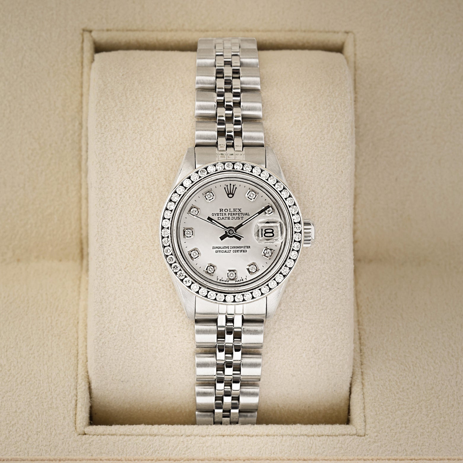 Vintage 1974 Rolex Lady-Datejust 26mm 6917 steel watch with aftermarket diamond bezel and white Mother of Pearl diamond dial at Noah's Fine Watches and Jewelry Dallas Texas