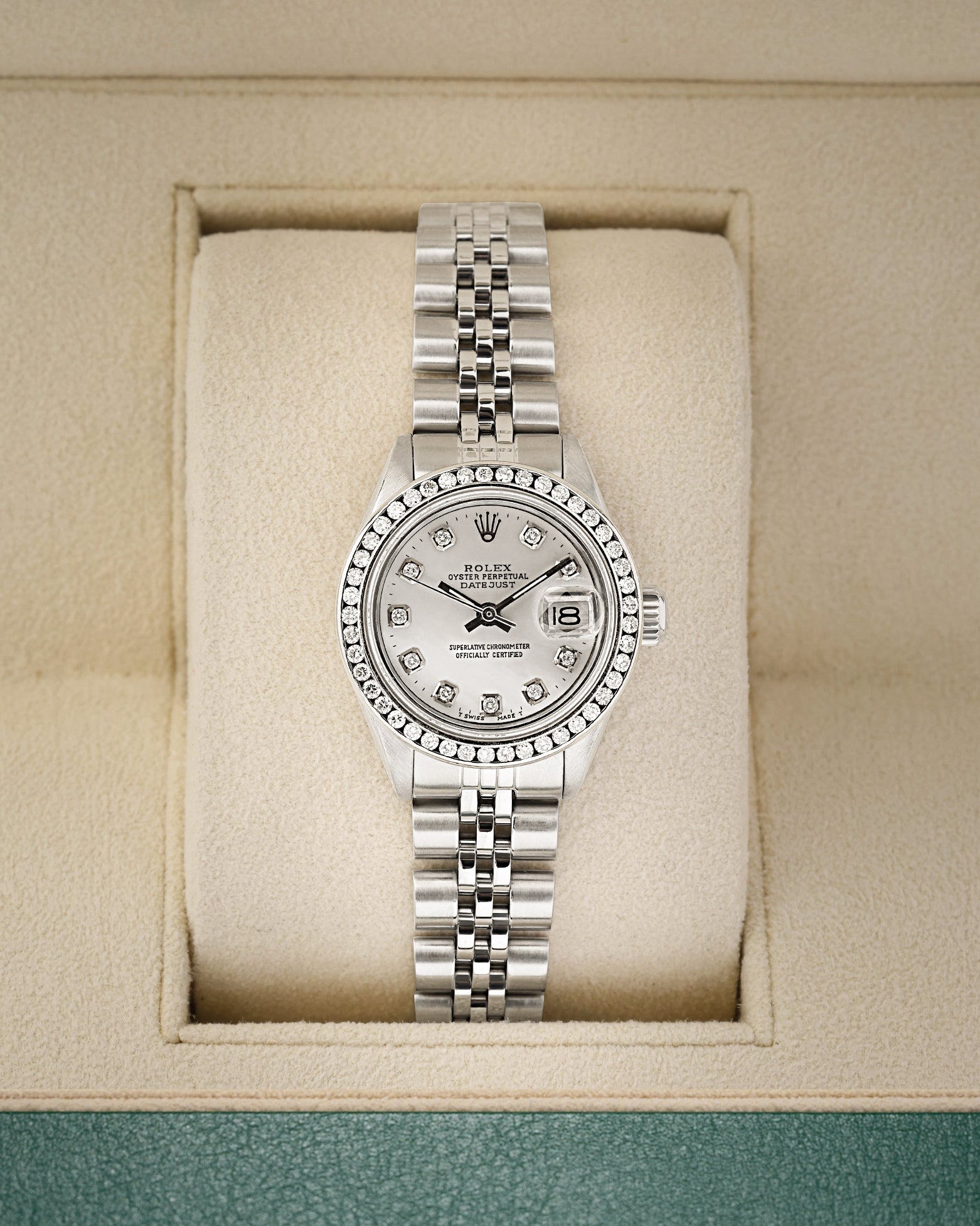 Vintage 1974 Rolex Lady-Datejust 26mm 6917 steel watch with aftermarket diamond bezel and white Mother of Pearl diamond dial at Noah's Fine Watches and Jewelry Dallas Texas