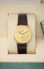 Vintage 1980 Rolex Cellini reference 4112 in 18k yellow gold with champagne dial and leather strap at Noah's Fine Watches & Jewelry in Dallas, Texas