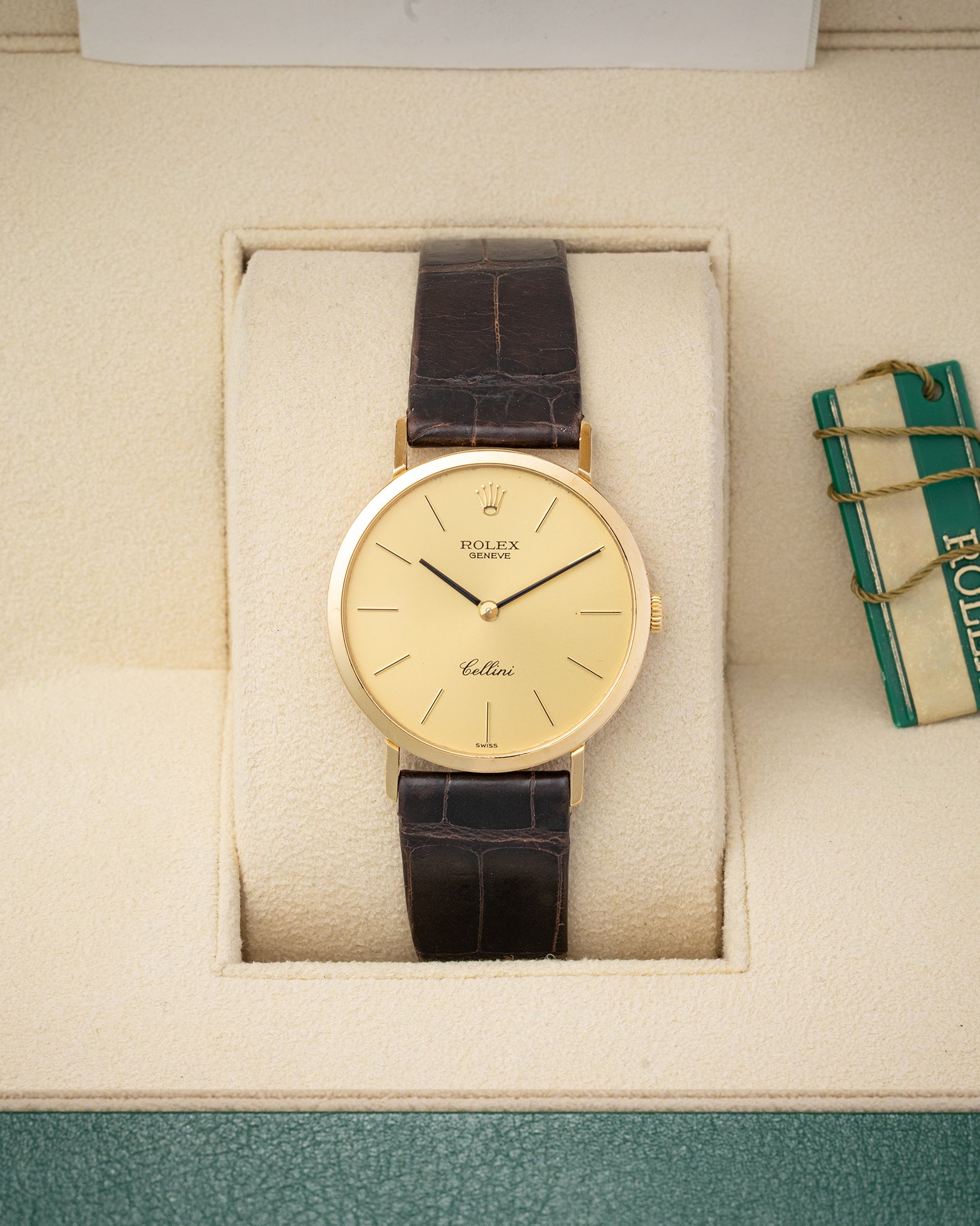 Vintage 1980 Rolex Cellini reference 4112 in 18k yellow gold with champagne dial and leather strap at Noah's Fine Watches & Jewelry in Dallas, Texas