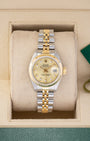 Vintage 1990 Rolex Lady-Datejust 26mm 69173 two-tone steel and yellow gold watch with champagne diamond dial at Noah's Fine Watches and Jewelry Dallas Texas
