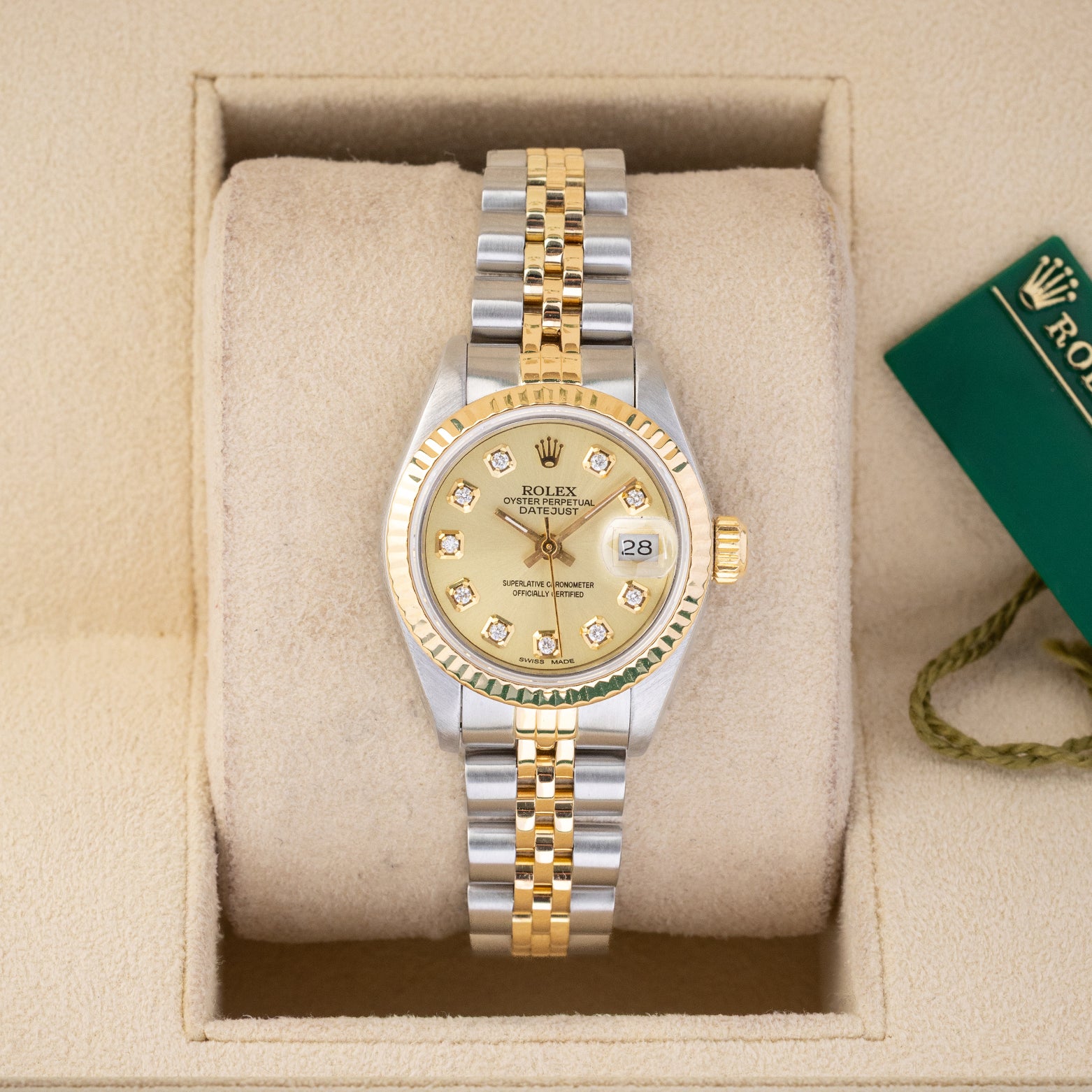 Vintage 1990 Rolex Lady-Datejust 26mm 69173 two-tone steel and yellow gold watch with champagne diamond dial at Noah's Fine Watches and Jewelry Dallas Texas