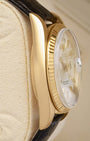 Left side perspective of the classic 36mm Oyster case profile and polished gold finish of the 1973 Rolex Day-Date President