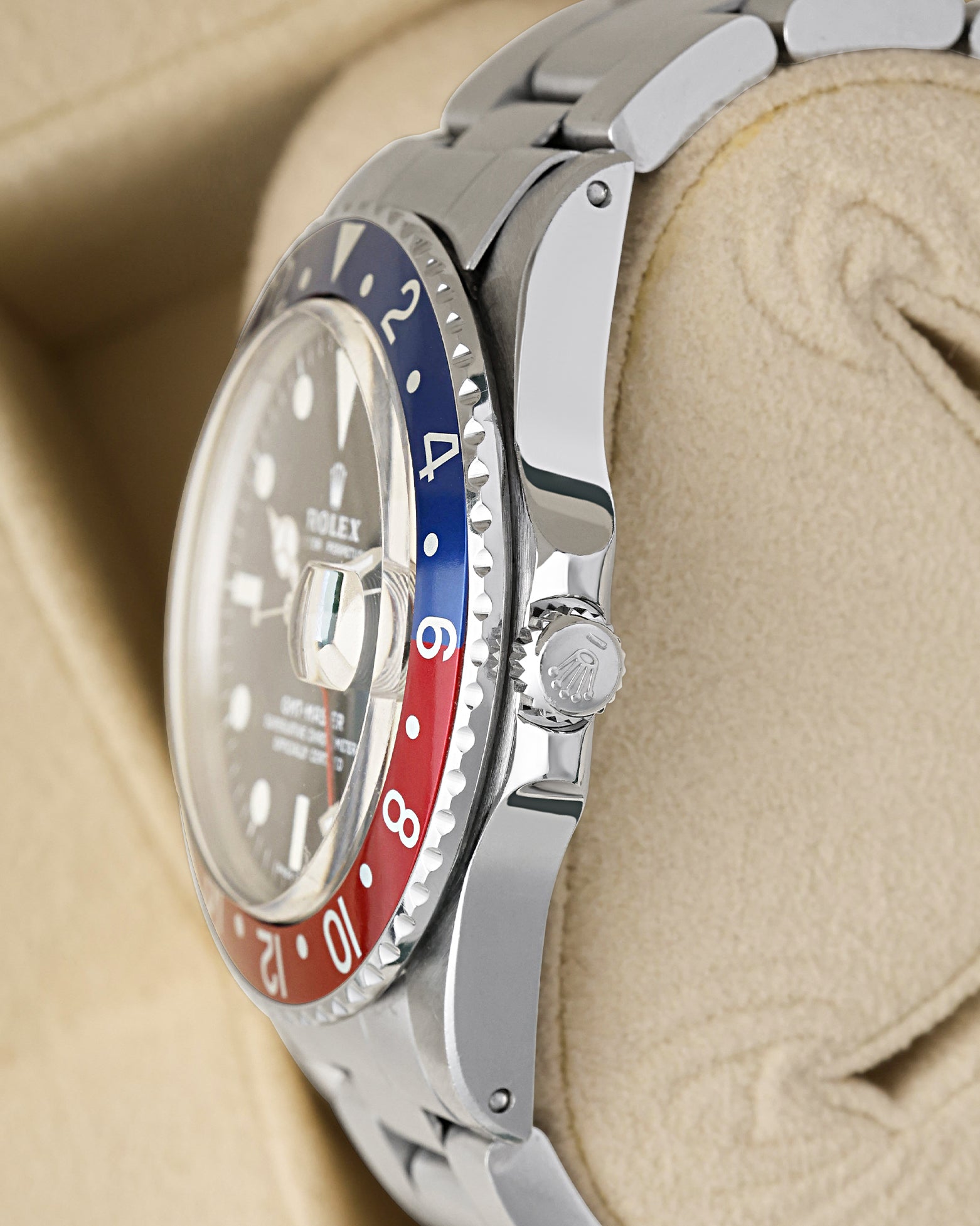 Stainless steel case profile view showcasing the small crown guards and original winding crown on a vintage 1966 Rolex GMT-Master 1675