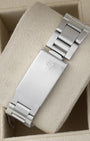 Rear view of the vintage stainless steel Oyster bracelet showing the traditional stamped folding box deployment clasp engraved with the period-correct Rolex crown coronet logo