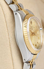Left-side macro profile view showcasing the mirror-polished stainless steel case flank and the classic tapered profile of the vintage feminine lugs