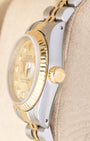 Two tone case profile view showcasing the 18k yellow gold screw-down winding crown on a vintage 26mm Rolex Lady-Datejust