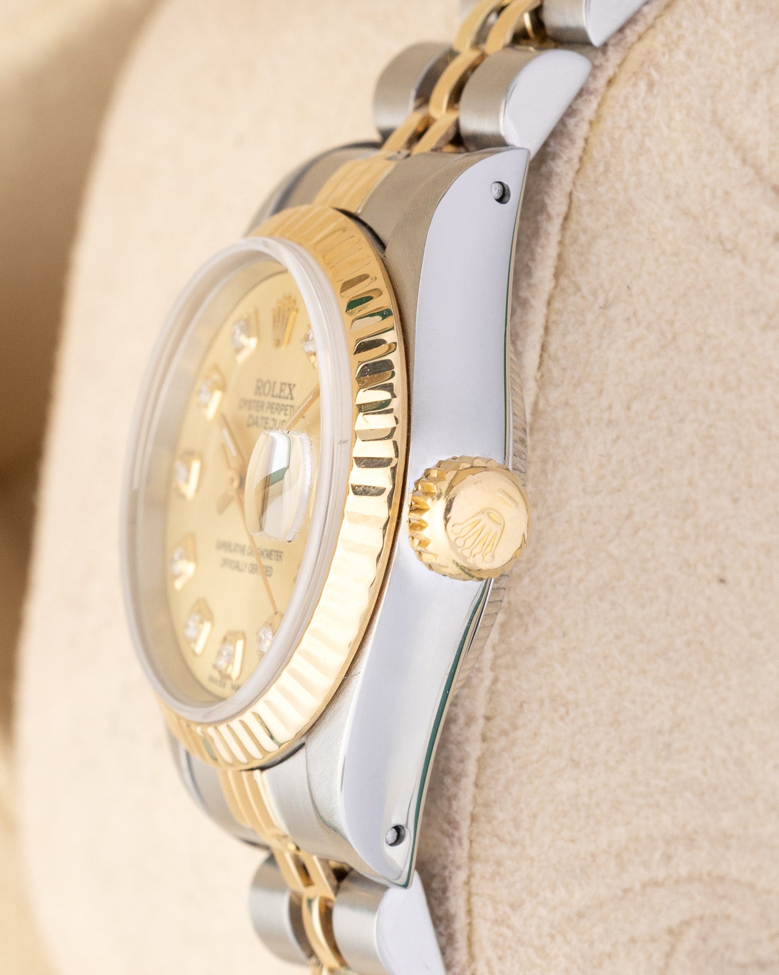 Two tone case profile view showcasing the 18k yellow gold screw-down winding crown on a vintage 26mm Rolex Lady-Datejust