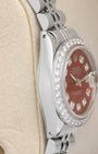 Side profile view of the polished stainless steel Oyster case on the non-crown side of a vintage 26mm Rolex Datejust