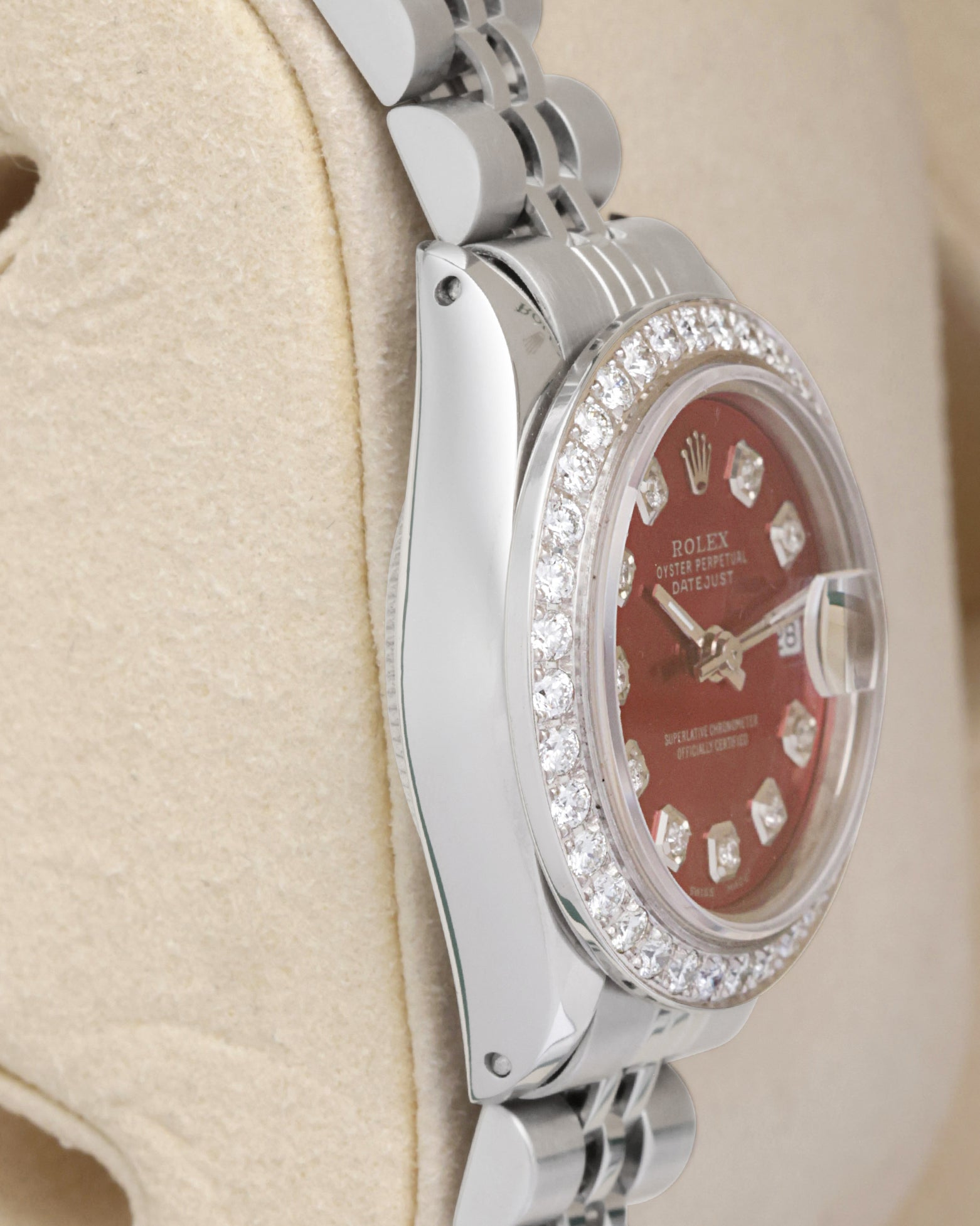 Side profile view of the polished stainless steel Oyster case on the non-crown side of a vintage 26mm Rolex Datejust