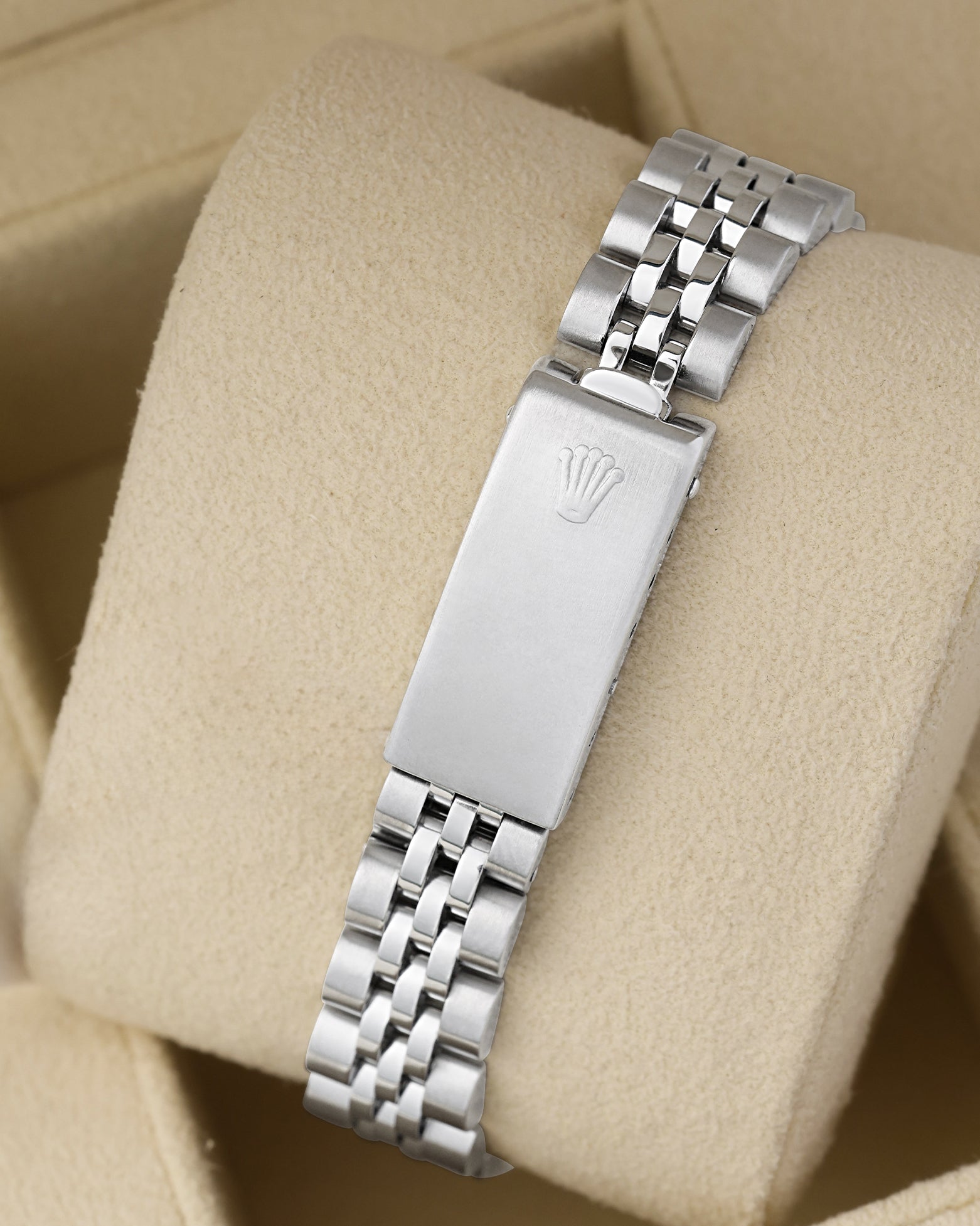 Rear view of the vintage stainless steel multi-link Jubilee bracelet showing the traditional folding deployment box clasp stamped with the Rolex crown coronet logo