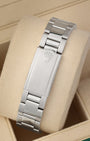 A rear view of the stainless steel Oyster metal link watch band focusing on the secure closure of the vintage fold-over deployant clasp detailed with an embossed Rolex crown logo