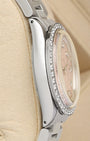 Left-side macro profile view showcasing the mirror-polished stainless steel case band wall and the classic curved silhouette of the integrated vintage lugs
