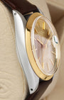 Left-side macro profile view showcasing the high-polished steel case wall and the period-correct drilled lug holes characteristic of late 1960s Rolex tool chassis engineering