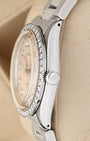 Close-up right profile view of the watch head highlighting the high-dome vintage acrylic Plexiglass crystal, the custom diamond bezel edge, and the fluted stainless steel screw-down winding crown