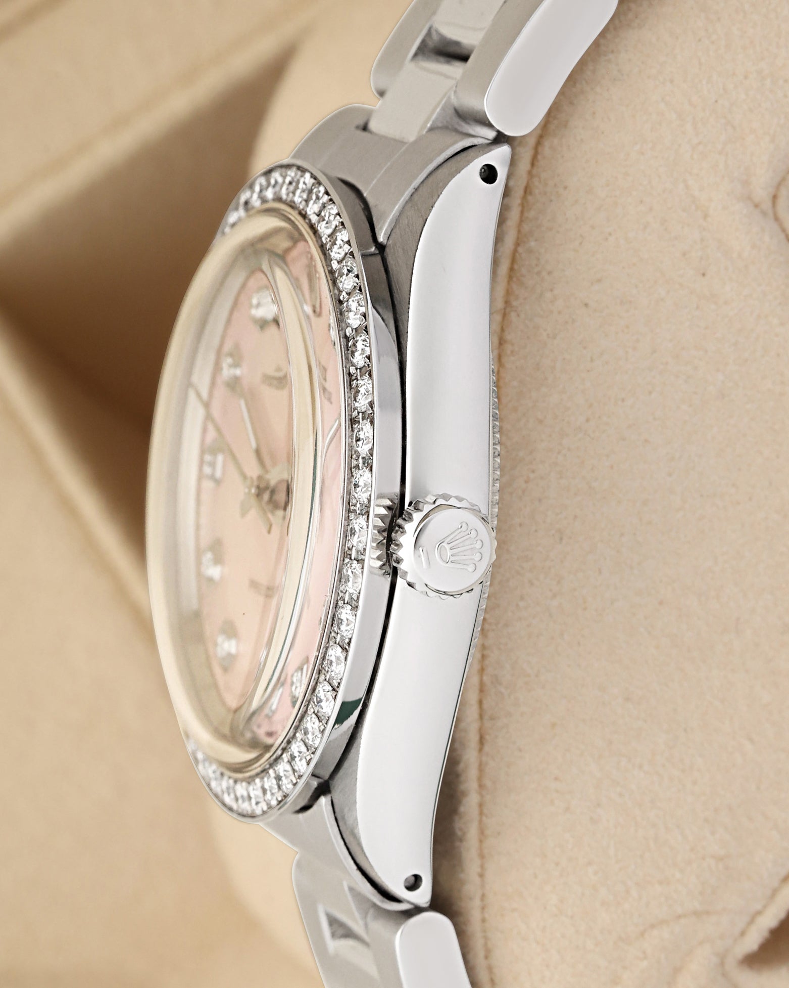 Close-up right profile view of the watch head highlighting the high-dome vintage acrylic Plexiglass crystal, the custom diamond bezel edge, and the fluted stainless steel screw-down winding crown