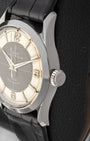 Close-up right profile view of the vintage steel Tudor 7950 case highlighting the original winding crown and smooth polished bezel